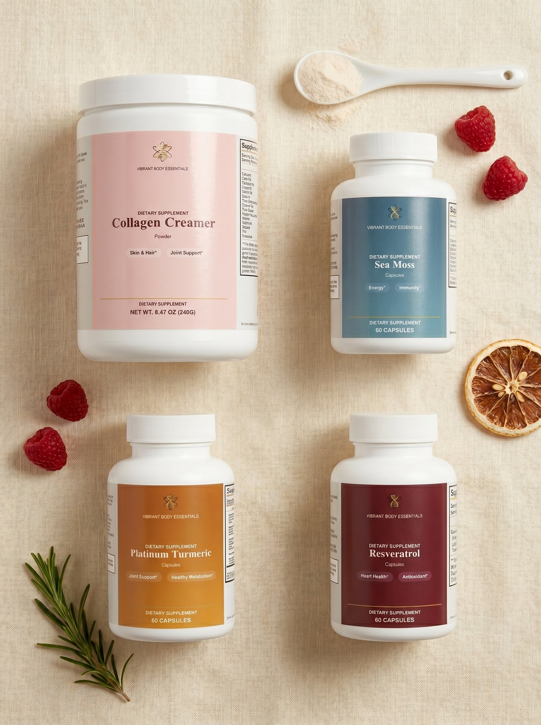 Glow from Within supplements on linen with raspberries, citrus, and rosemary